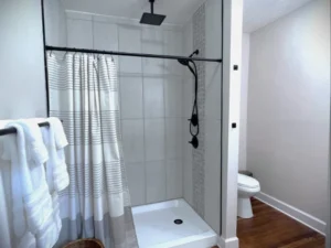 En suite with rain shower main level